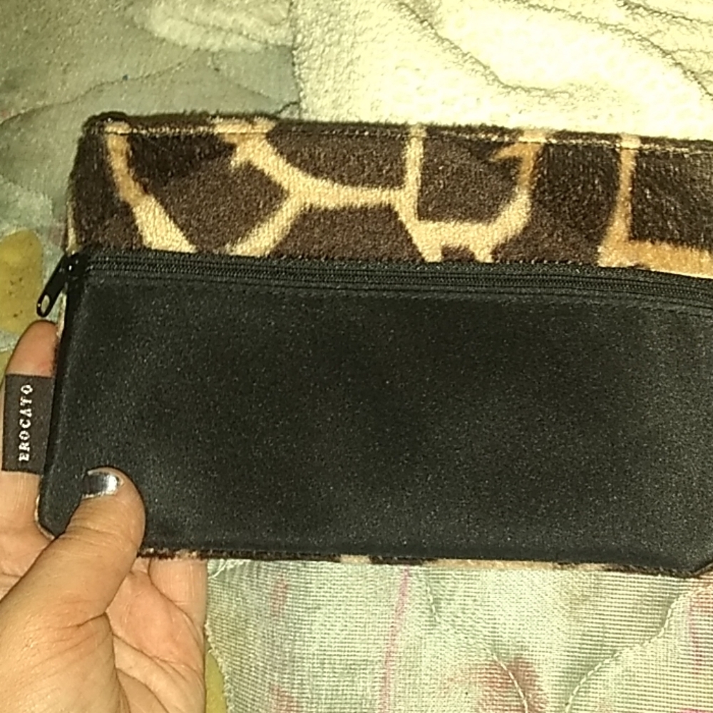 A cheetah print brocato makeup bag